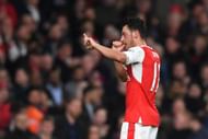 LONDON, ENGLAND - APRIL 05:  Mesut Ozil of Arsenal celebrates scoring his sides first goal during the Premier League match between Arsenal and West Ham United at the Emirates Stadium on April 5, 2017 in London, England.  (Photo by Shaun Botterill/Getty Images,)